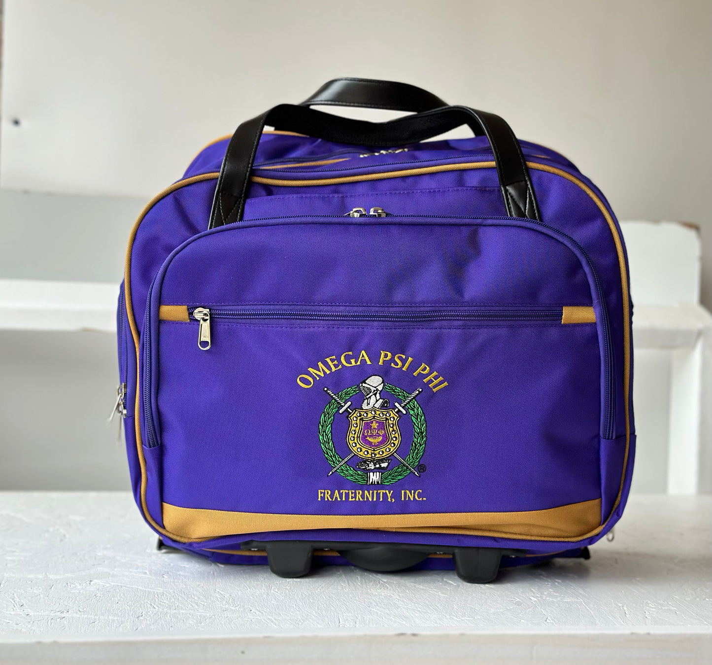 Omega Psi Phi Fraternity Royal Purple & Old Gold color Laptop with Trolley- Luggage/cabin Bag for travelling.- authorized vendor
