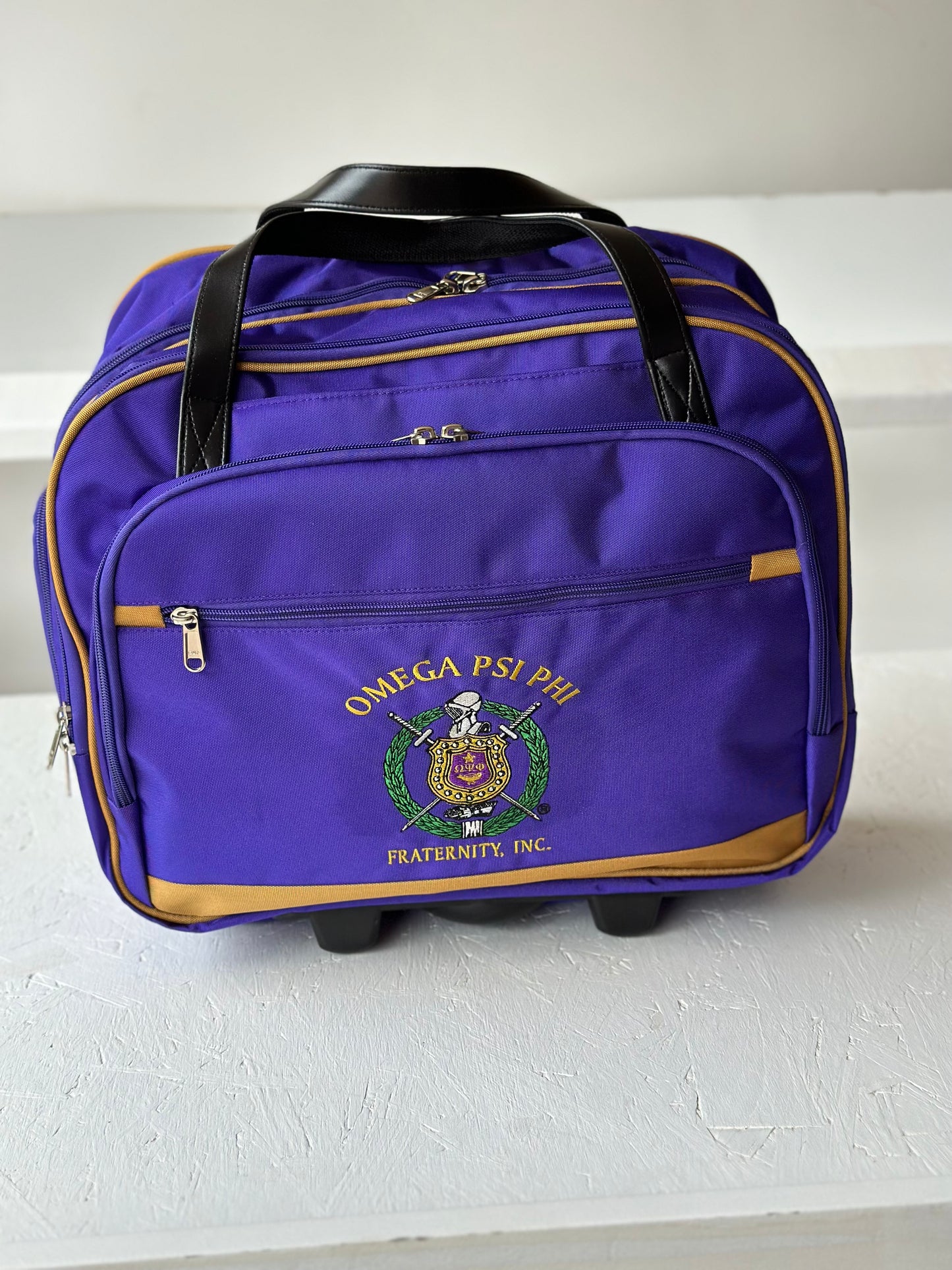 Omega Psi Phi Fraternity Royal Purple & Old Gold color Laptop with Trolley- Luggage/cabin Bag for travelling.- authorized vendor