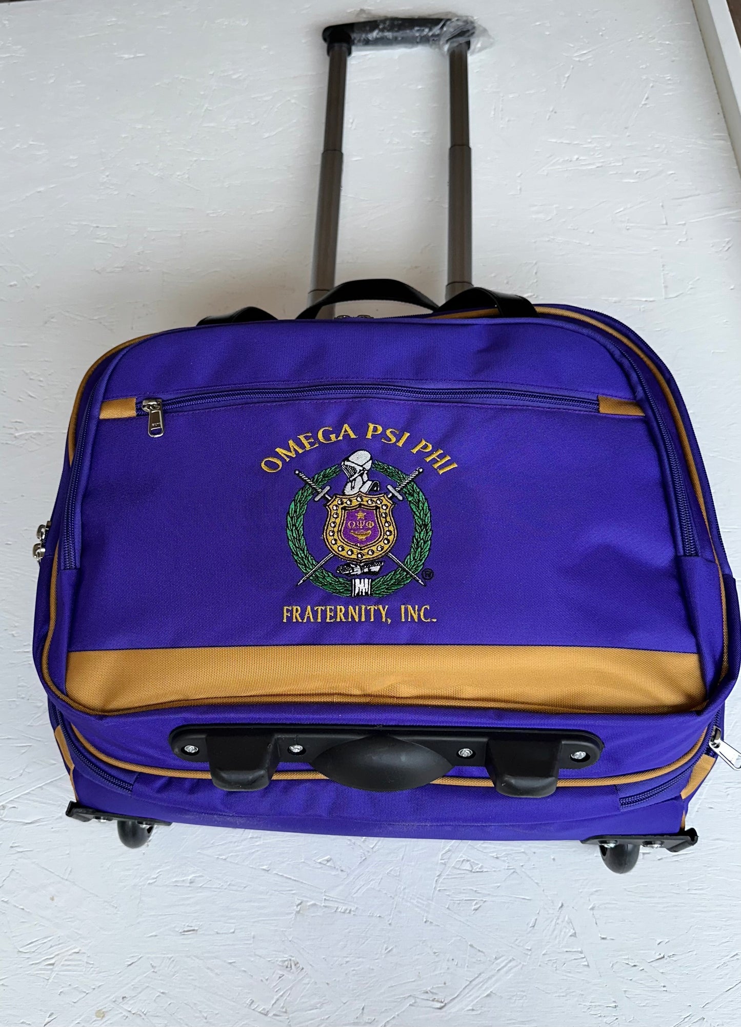 Omega Psi Phi Fraternity Royal Purple & Old Gold color Laptop with Trolley- Luggage/cabin Bag for travelling.- authorized vendor