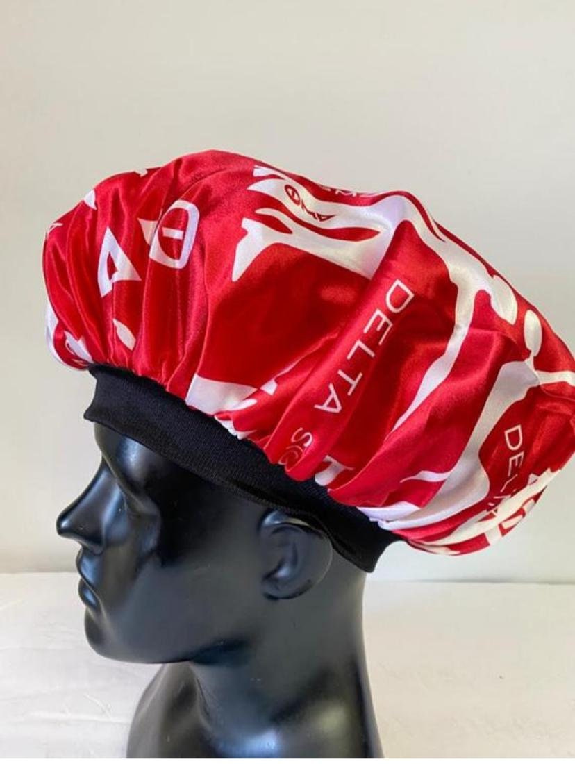 Delta Sigma Theta Sleeping Cap/Bonnet with Greek letters and Fortitude Lady printed on it, Satin Fabric, Soft Lycra Band, White & Red Color.