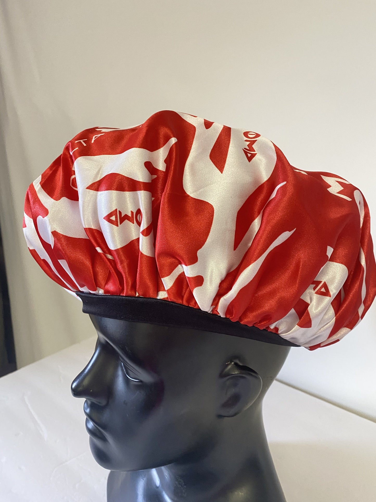 Delta Sigma Theta Sleeping Cap/Bonnet with Greek letters and Fortitude Lady printed on it, Satin Fabric, Soft Lycra Band, White & Red Color.