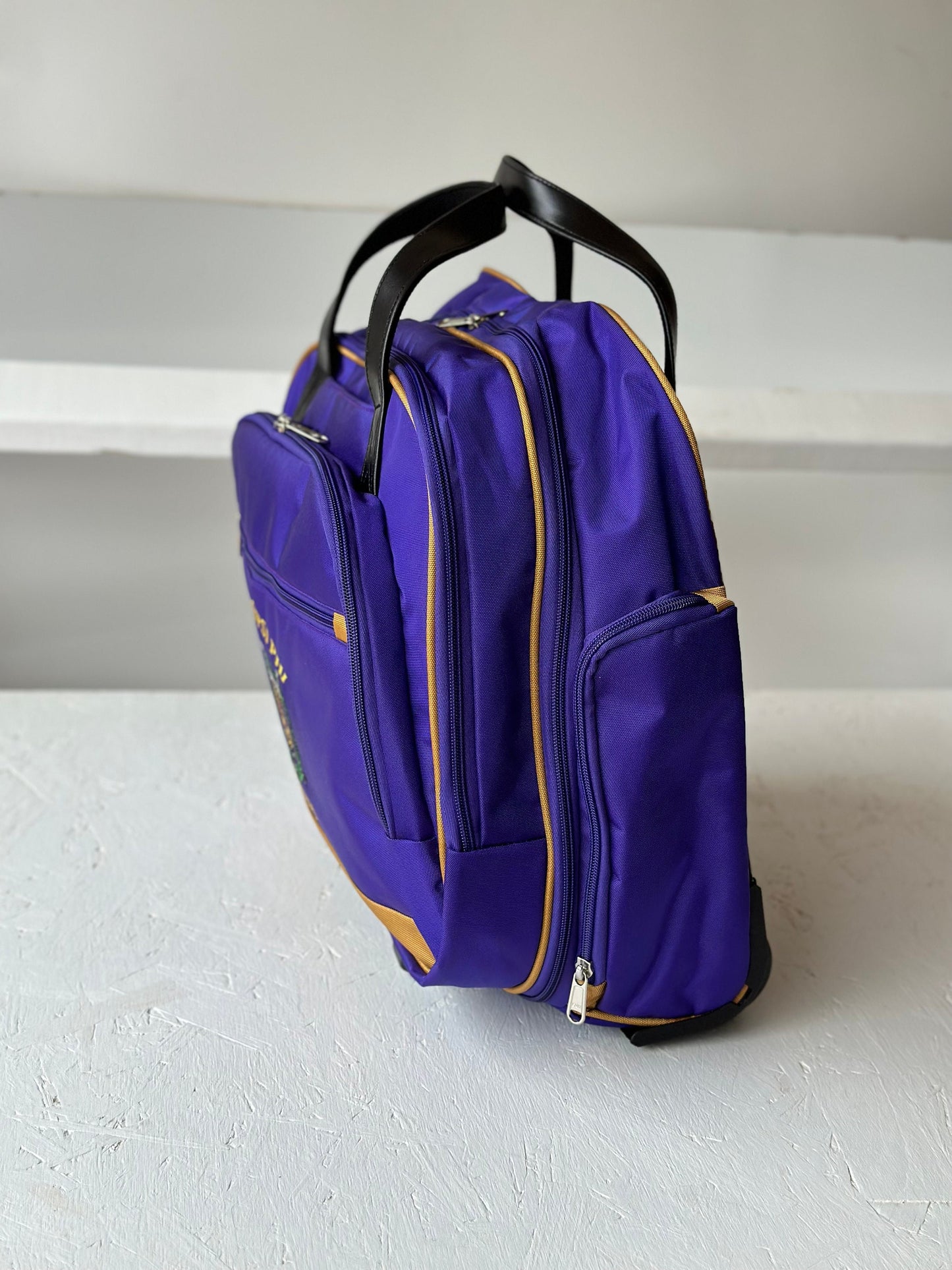 Omega Psi Phi Fraternity Royal Purple & Old Gold color Laptop with Trolley- Luggage/cabin Bag for travelling.- authorized vendor