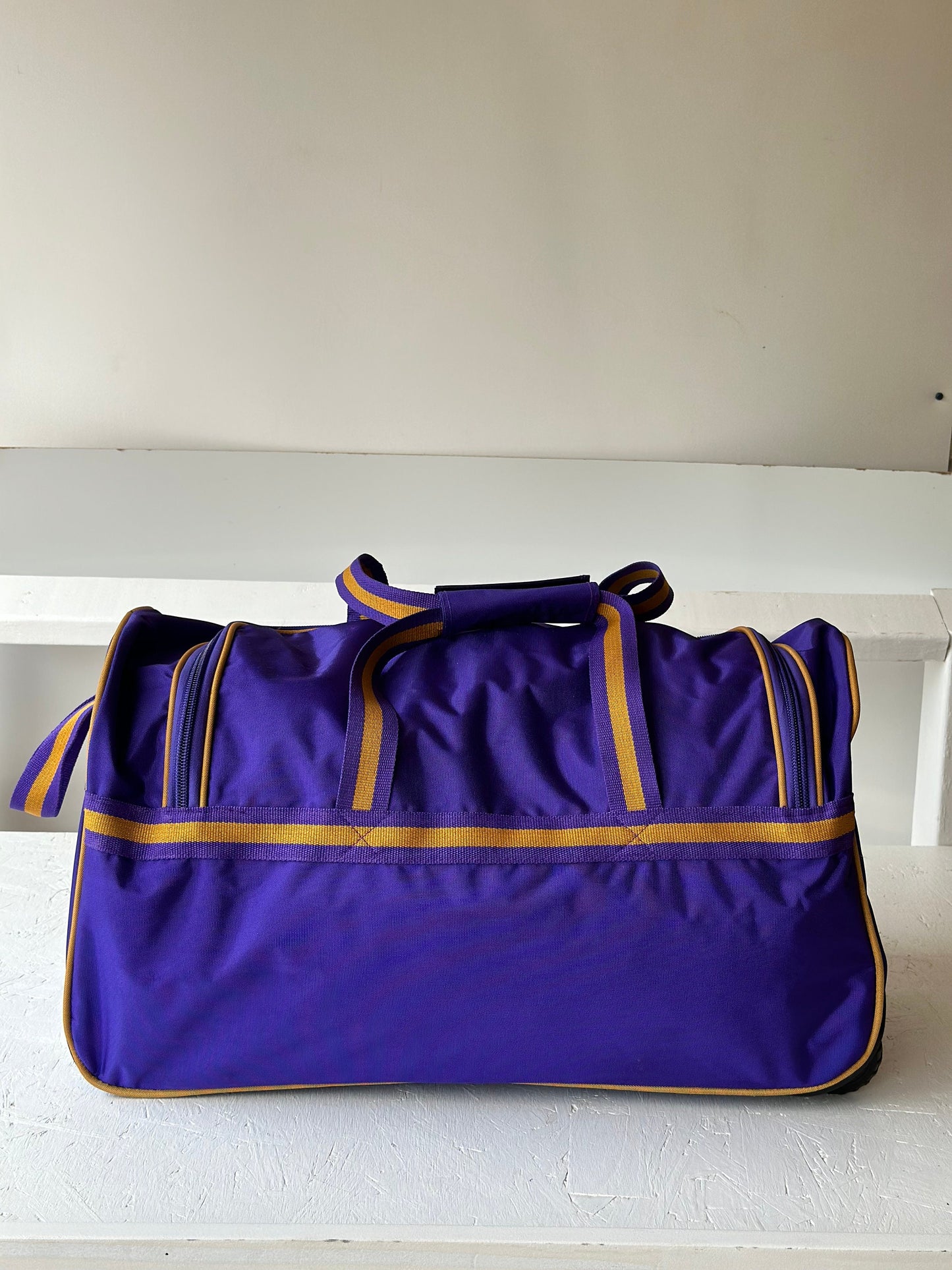 Omega Psi Phi Fraternity Royal Purple & Old Gold color Trolley/ Duffle/ Luggage Bag for travelling.- authorized vendor
