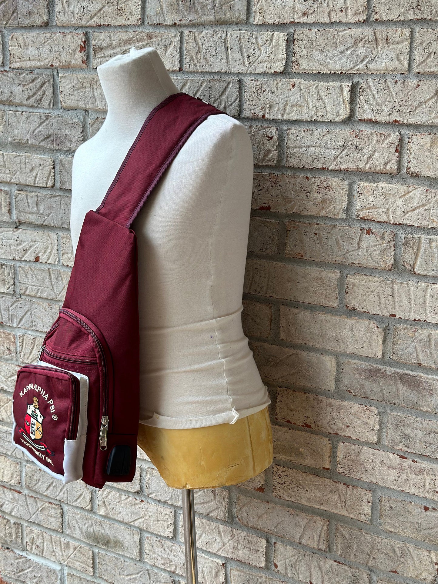 Kappa Alpha Psi Fraternity, single Shoulder Crossbody Sling/Shoulder bag with USB Port, Embroidered Organizational Shield in Front