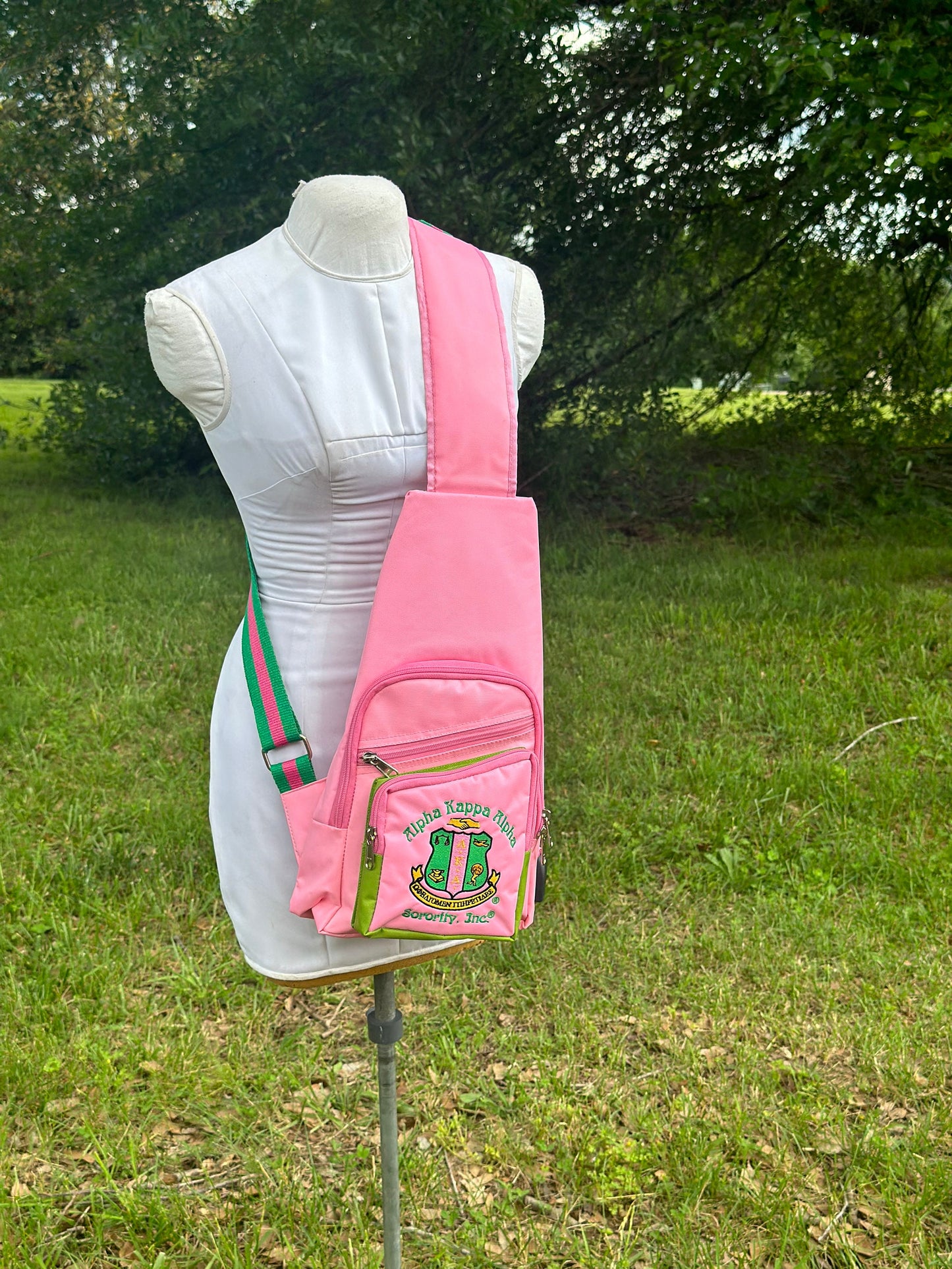 Alpha Kappa Alpha (AKA) Black or Pink One Shoulder Crossbody Sling/Shoulder bag with USB Port, Embroidered Organizational Shield in Front.