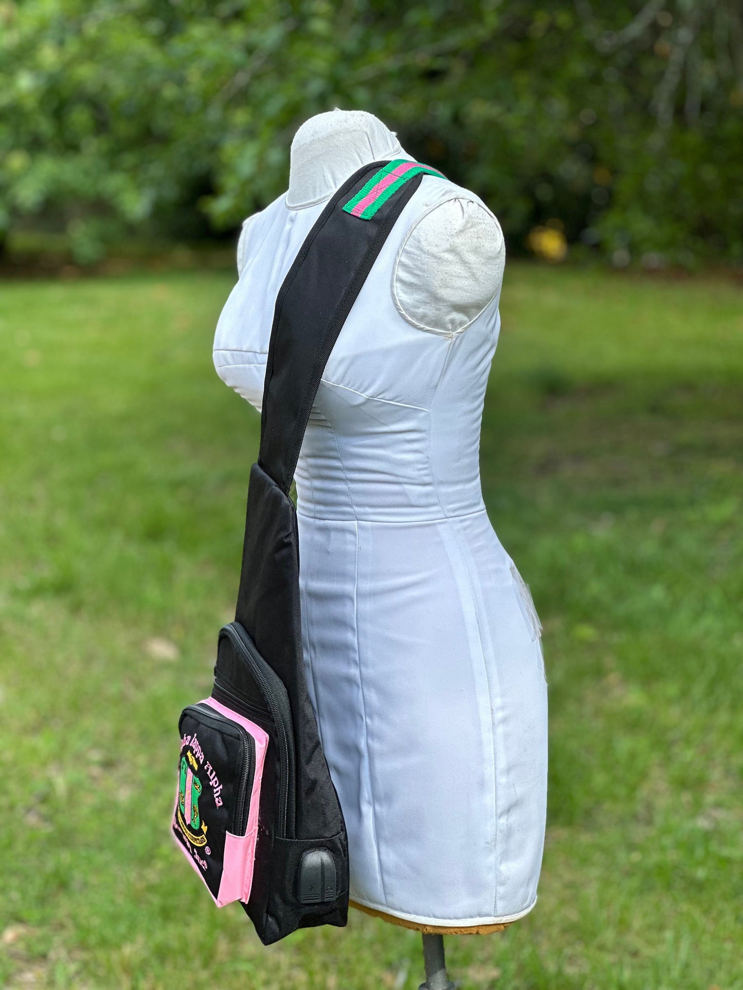 Alpha Kappa Alpha (AKA) Black or Pink One Shoulder Crossbody Sling/Shoulder bag with USB Port, Embroidered Organizational Shield in Front.
