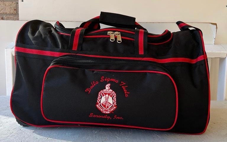 Delta Sigma Theta (DST) Red & Black color Trolley/ Duffle/ Luggage Bag for travelling.- authorized vendor