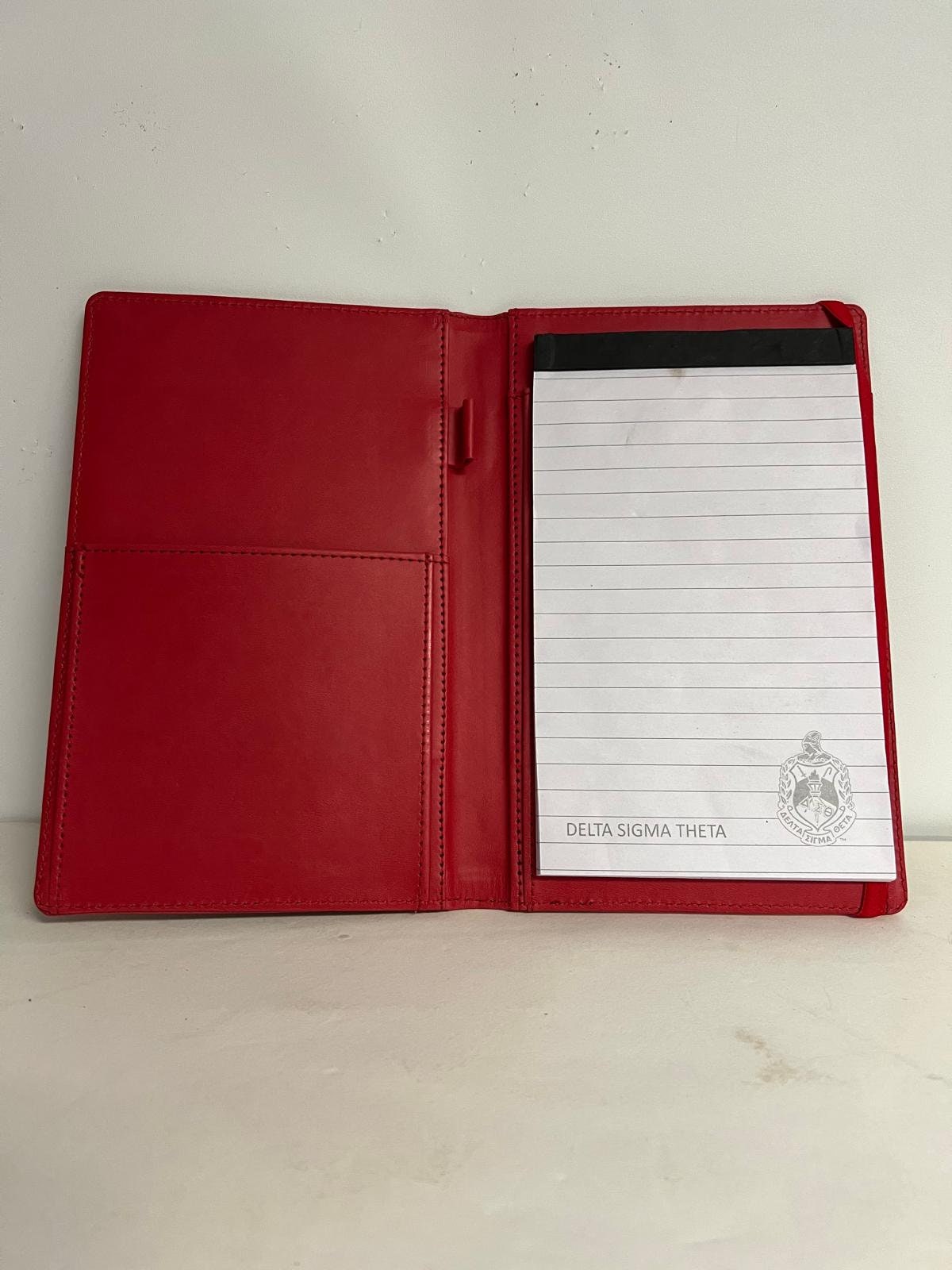 Delta Sigma Theta (ΔΣΘ) Sorority Artificial Leather NOTEBOOK- organizational shield print on front Red Color.
