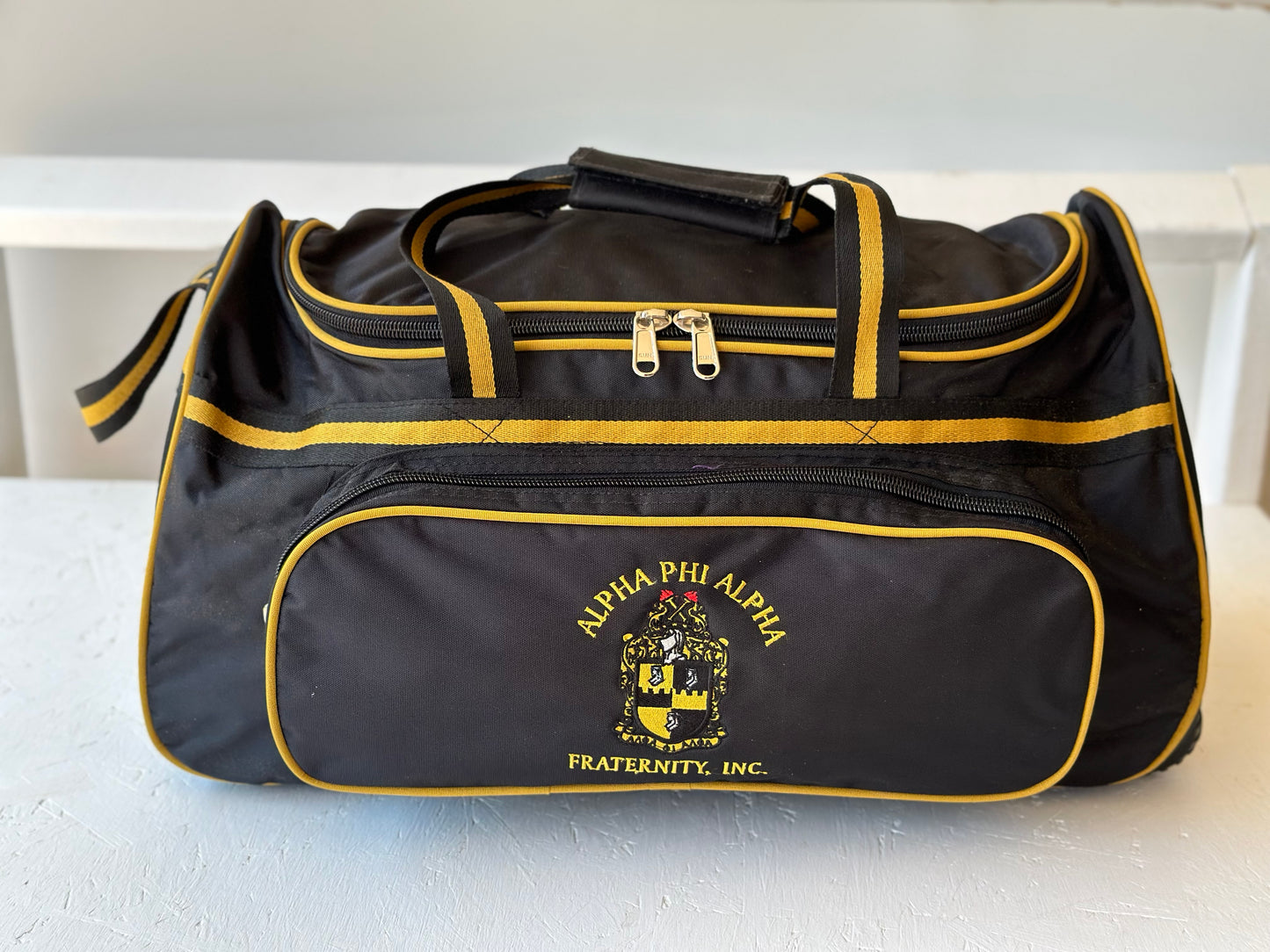 Alpha Phi Alpha Fraternity Black & Old Gold color Trolley/ Duffle/ Luggage Bag for travelling.