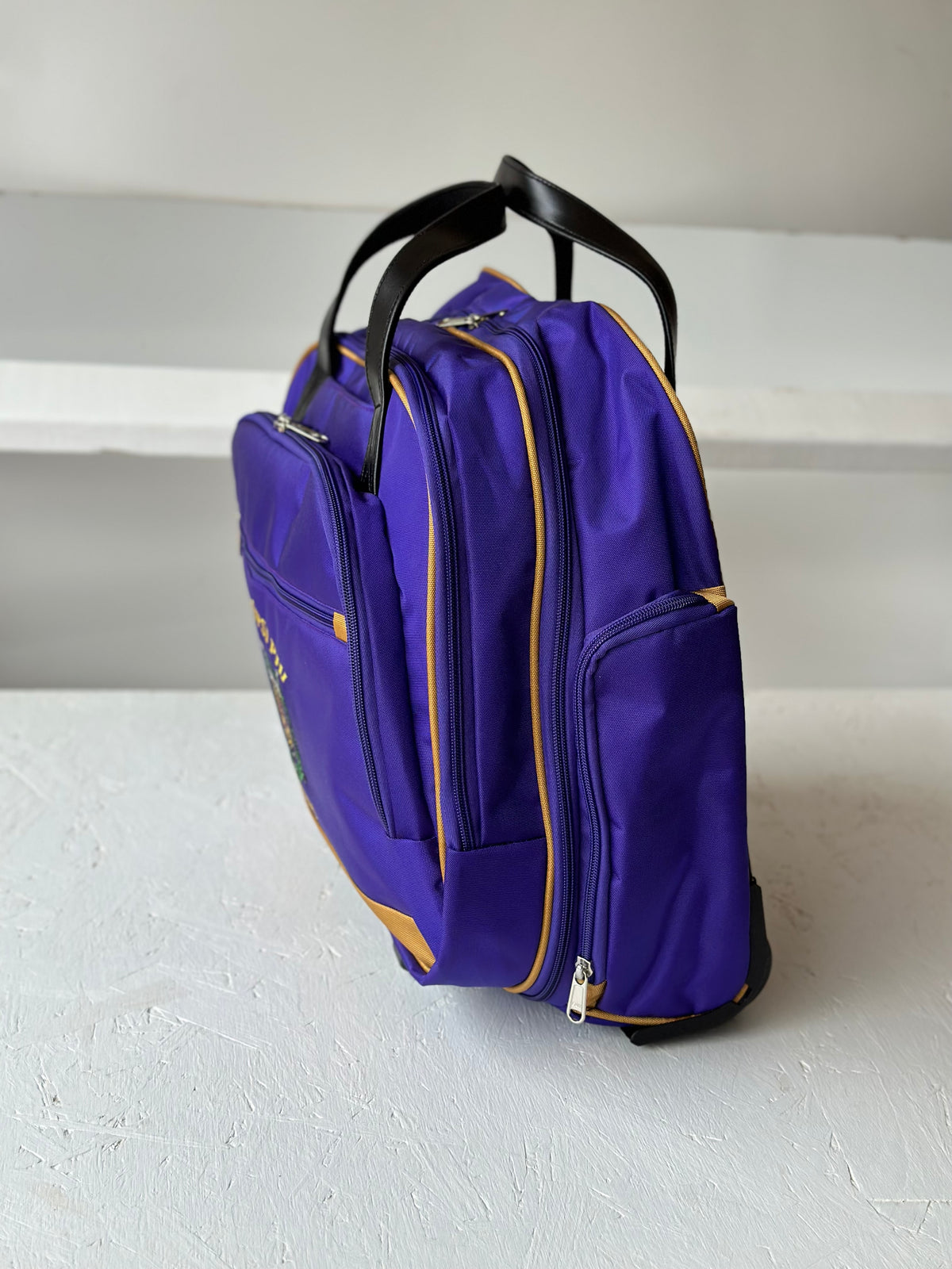 Omega Psi Phi Fraternity Royal Purple & Old Gold color Laptop with Trolley- Luggage/cabin Bag for travelling.- authorized vendor