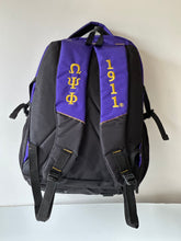 Load image into Gallery viewer, Omega Psi Phi (ΩΨΦ) Fraternity Royal Purple Stylish, Polyester Fabric Coated College Backpack with laptop sleeves For Men, Made in India.
