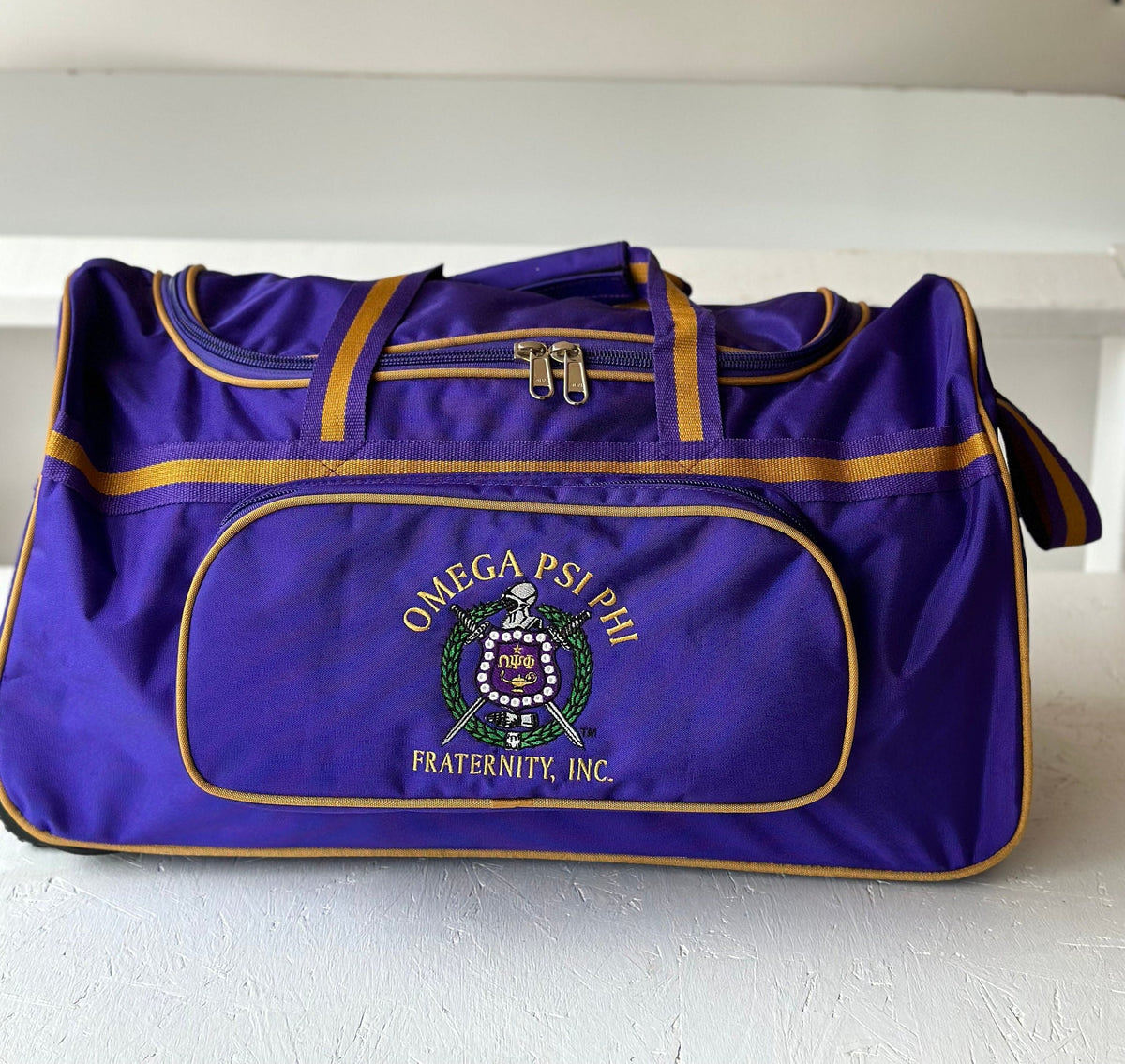 Omega Psi Phi Fraternity Royal Purple & Old Gold color Trolley/ Duffle/ Luggage Bag for travelling.- authorized vendor