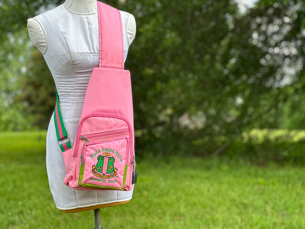 Alpha Kappa Alpha (AKA) Black or Pink One Shoulder Crossbody Sling/Shoulder bag with USB Port, Embroidered Organizational Shield in Front.