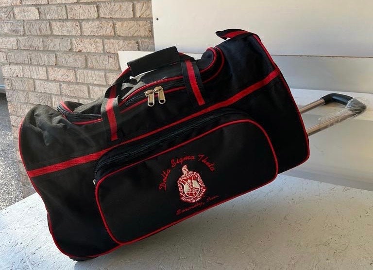 Delta Sigma Theta (DST) Red & Black color Trolley/ Duffle/ Luggage Bag for travelling.- authorized vendor
