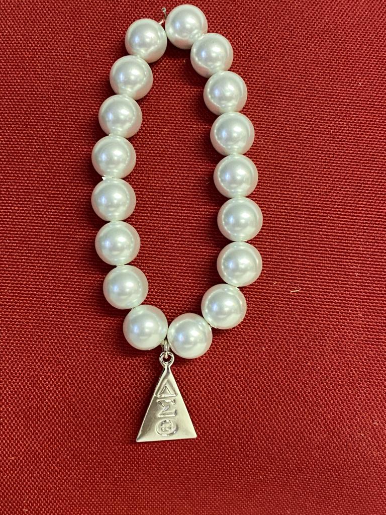 White pearls with silver triangle