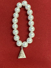 Load image into Gallery viewer, White pearls with silver triangle
